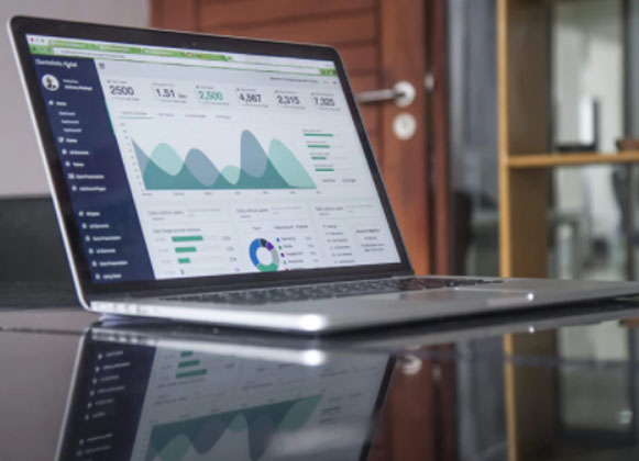 Laptop showing free business curve page