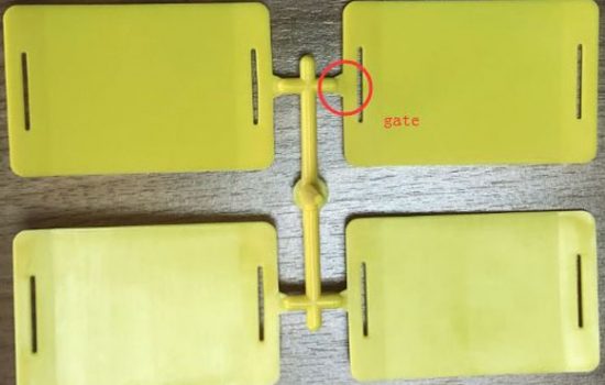 Plastic injection molding gates